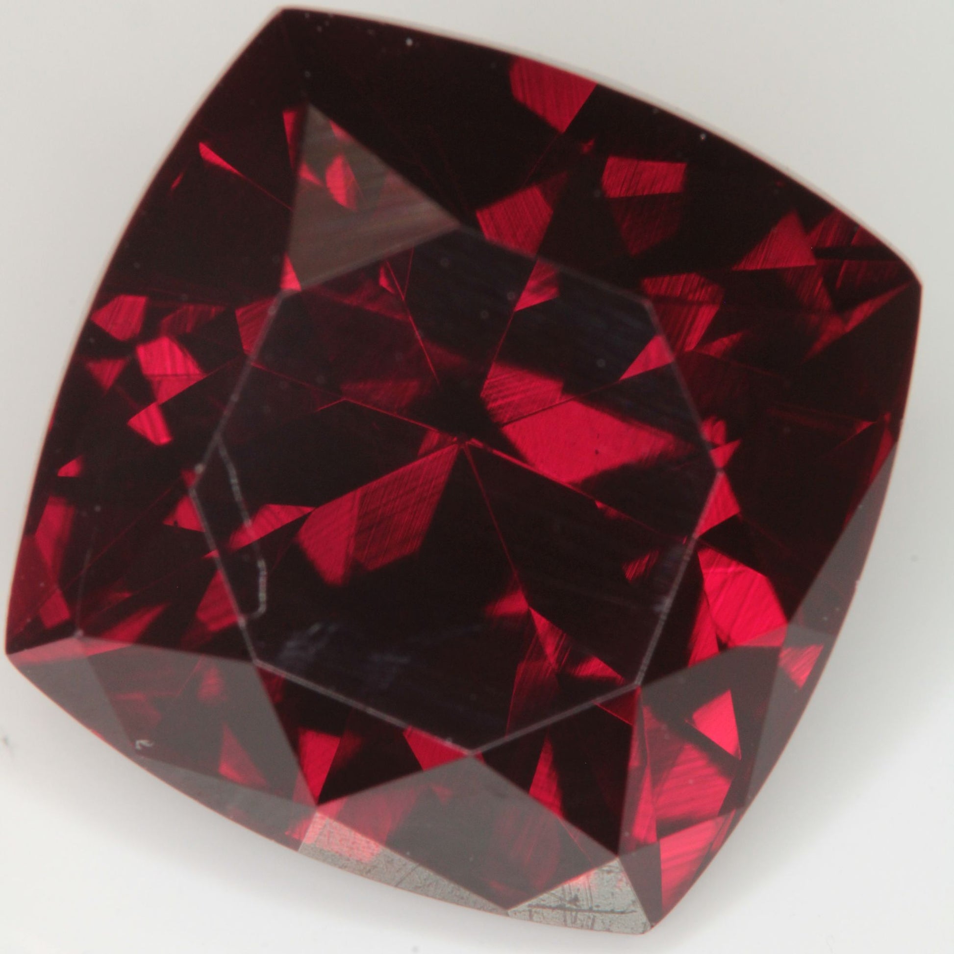 Faceted Flame Fusion Ruby Cushion Gemstone