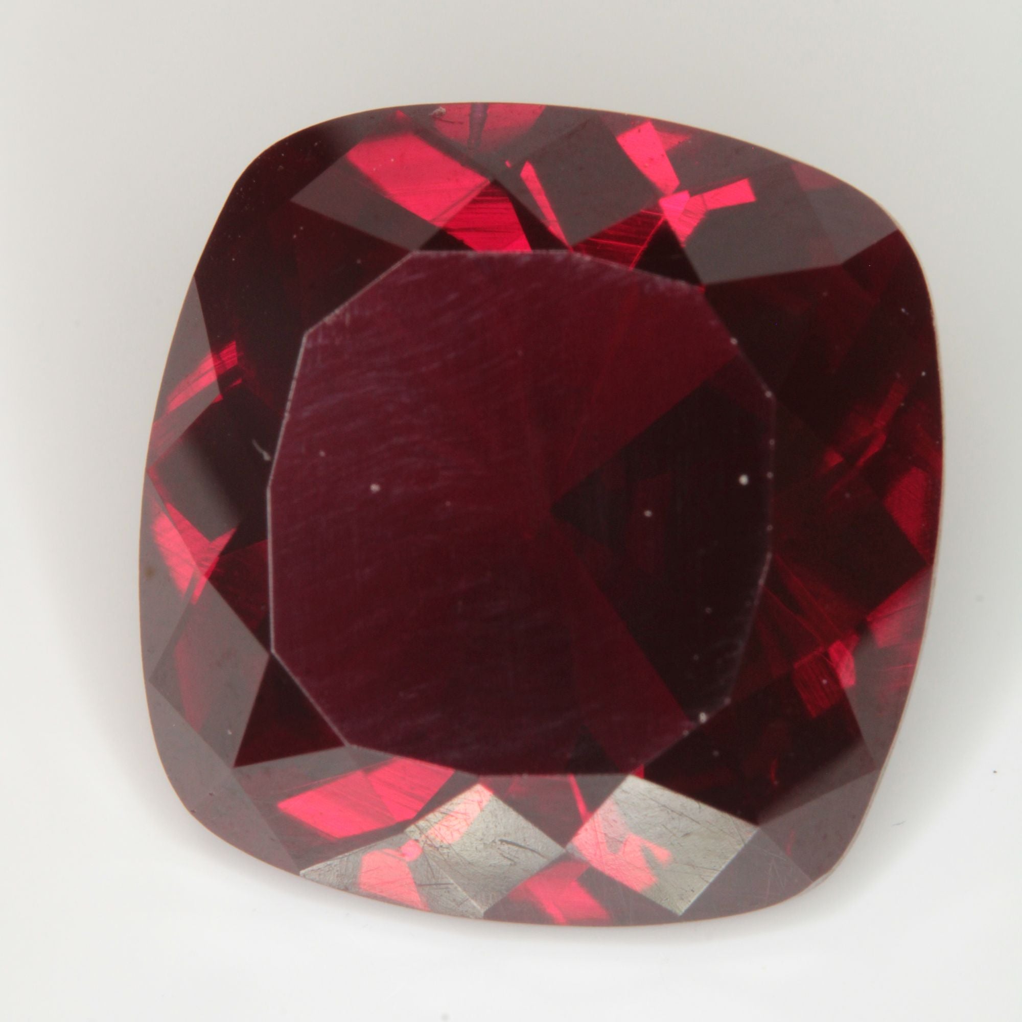 Faceted Flame Fusion Ruby Cushion Gemstone