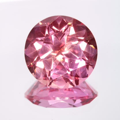Faceted Orange-Pink Round Fancy Sapphire Gem