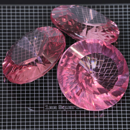 Faceted Strawberry Titanium Sapphire Shallow Spiral gemstone