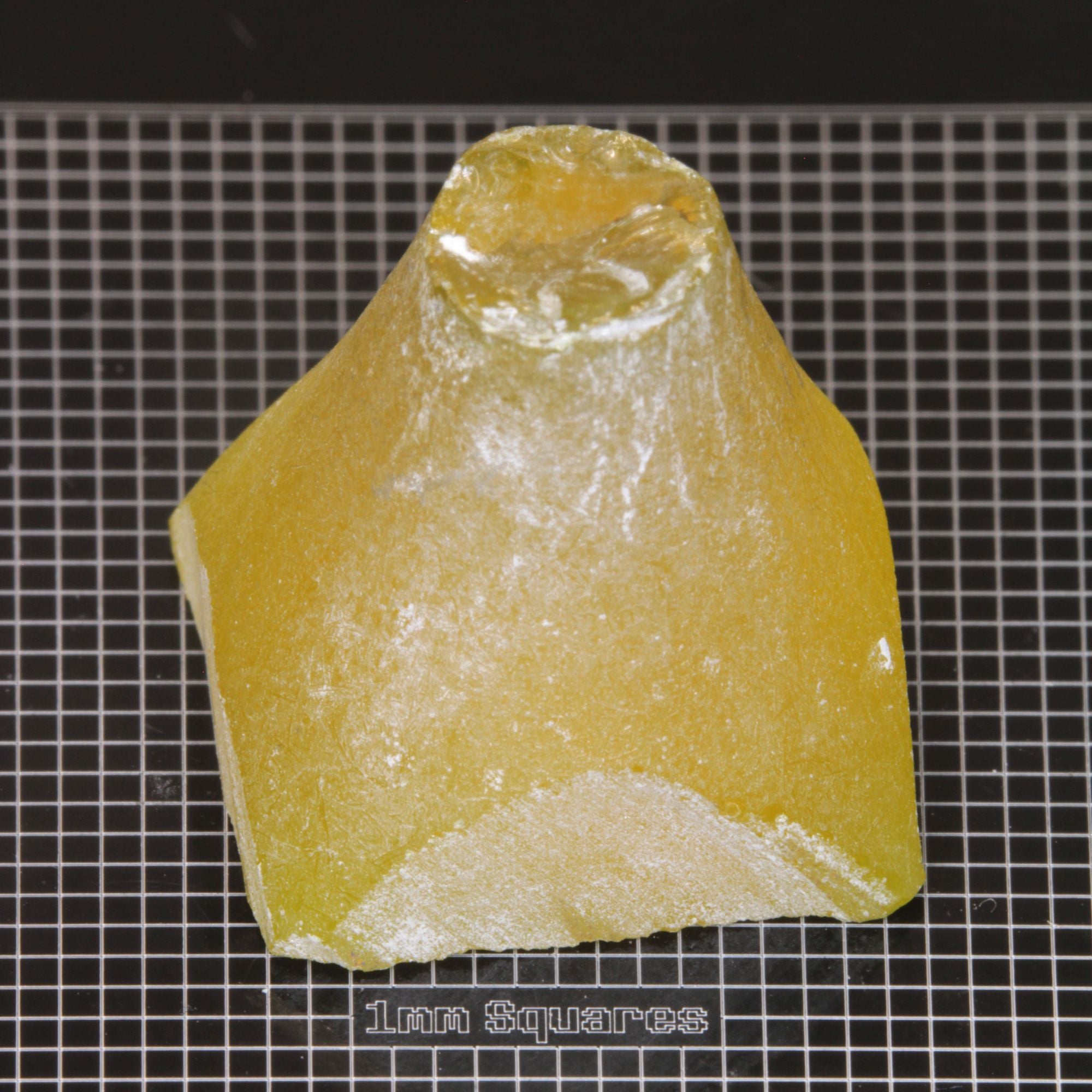 rough Ce/Nd YAG Cone End gemstone sized for USFG single stone competition 2026