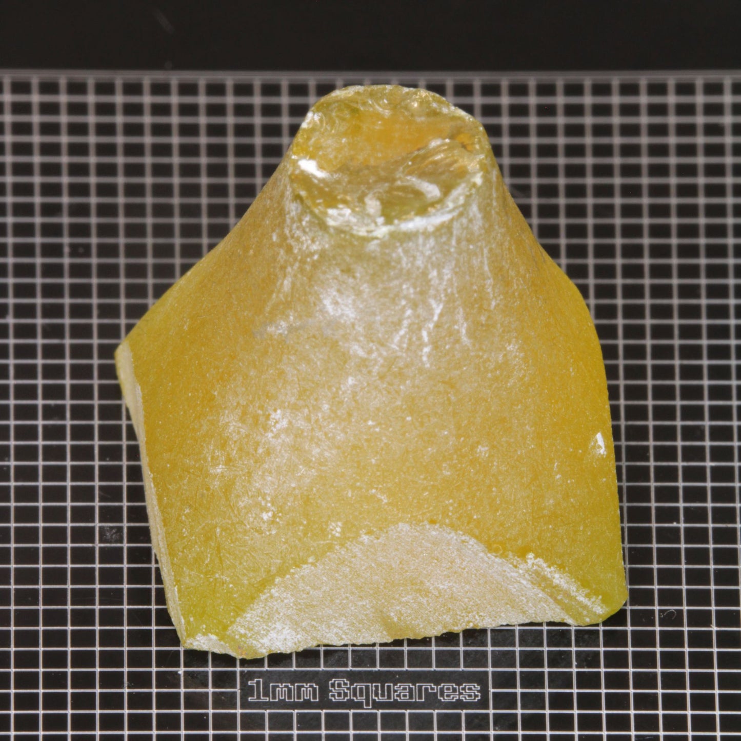 rough Ce/Nd YAG Cone End gemstone sized for USFG single stone competition 2026