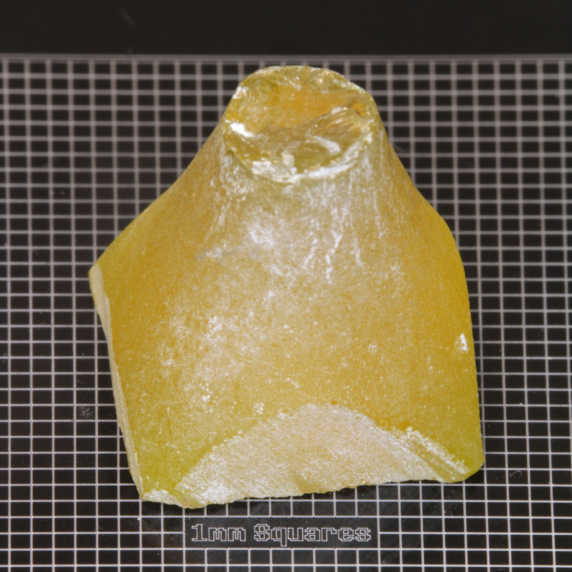 rough Ce/Nd YAG Cone End gemstone sized for USFG single stone competition 2026