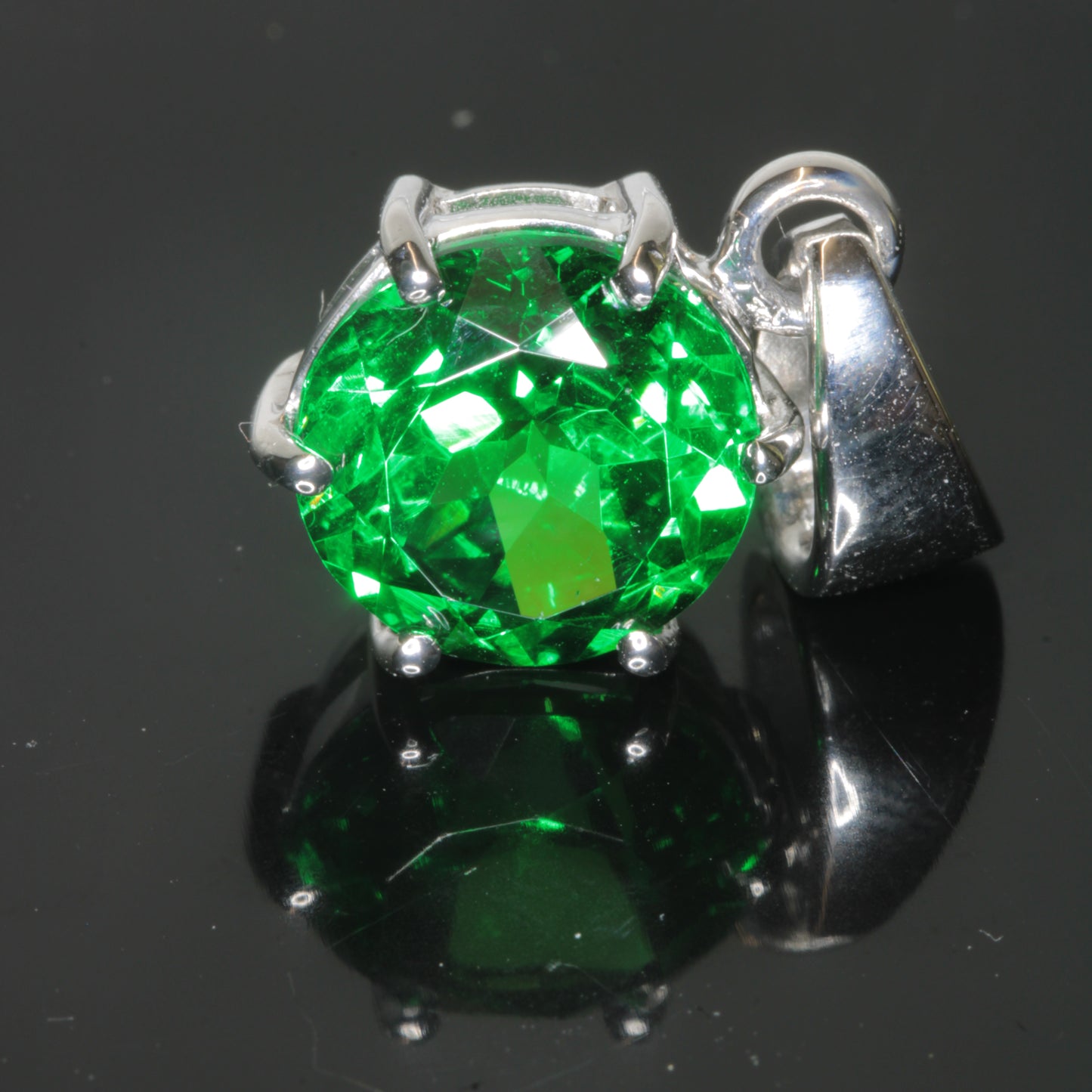 Green Chromium Thulium Holmium:YAG dangle pendant in sterling silver