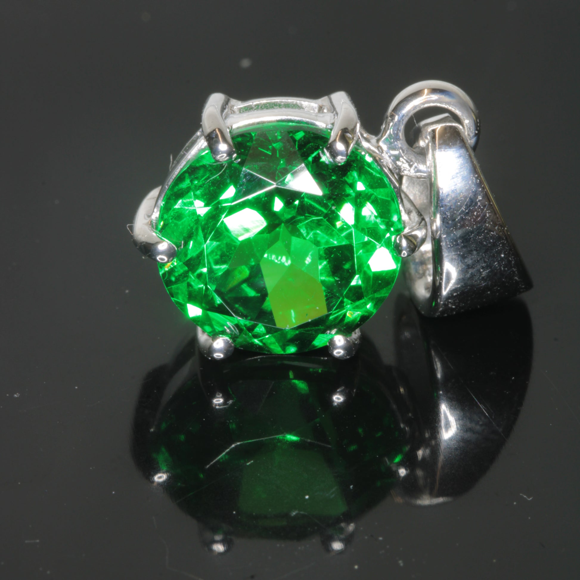 Green Chromium Thulium Holmium:YAG dangle pendant in sterling silver