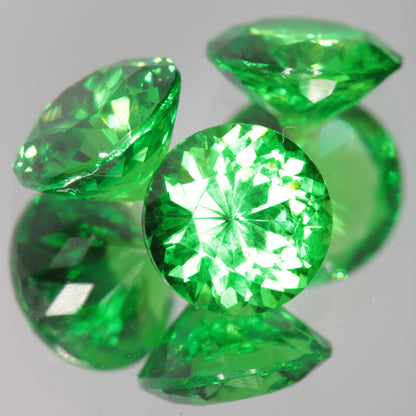 Green CTH:YAG 5mm Round faceted lab gemstone