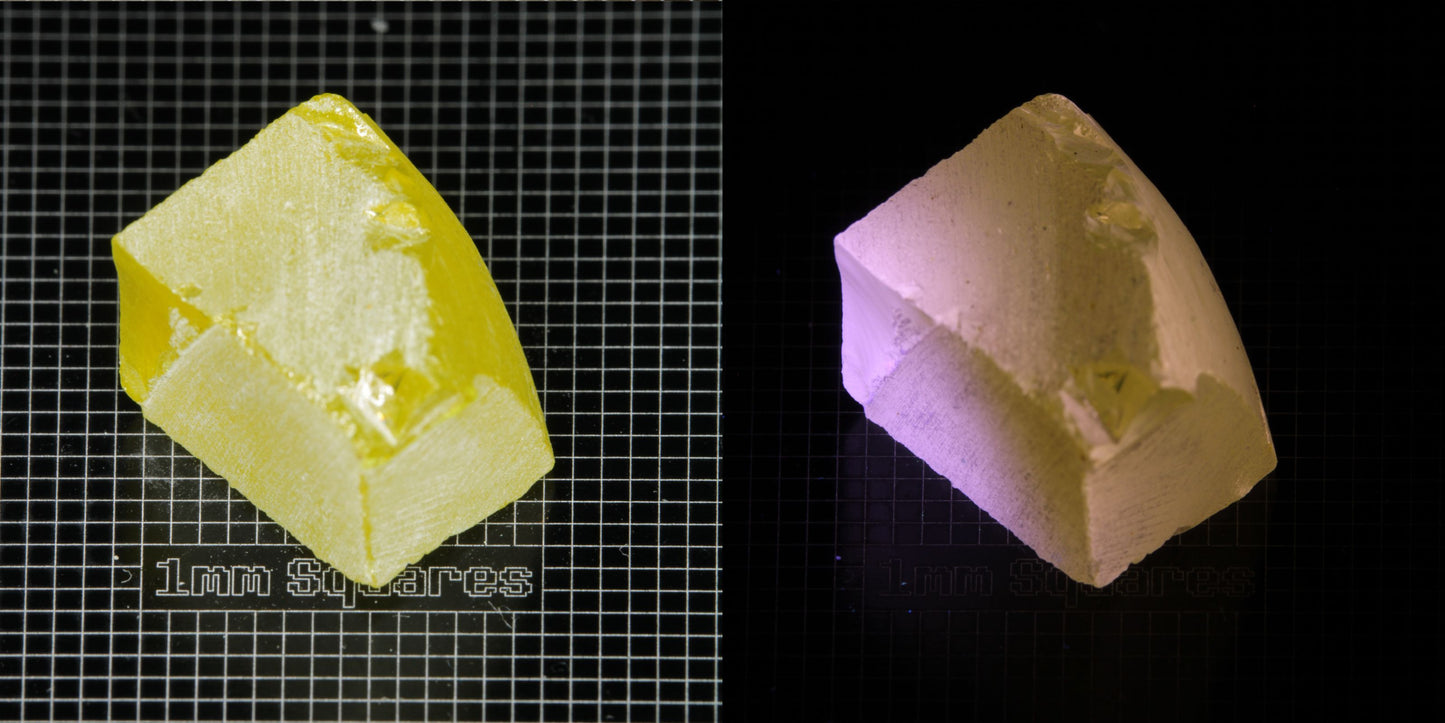 Ce/Nd YAG Curved Edge (Pink Glow) rough for gem cutting
