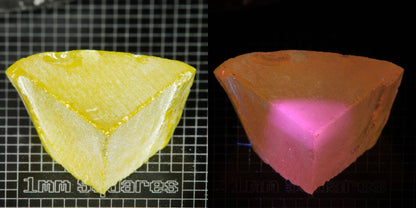 Ce/Nd YAG Quarter Edge (Pink Glow) rough for gem cutting
