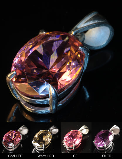 Erbium YAG Oval Pendant Showing Color Change under Different Lighting