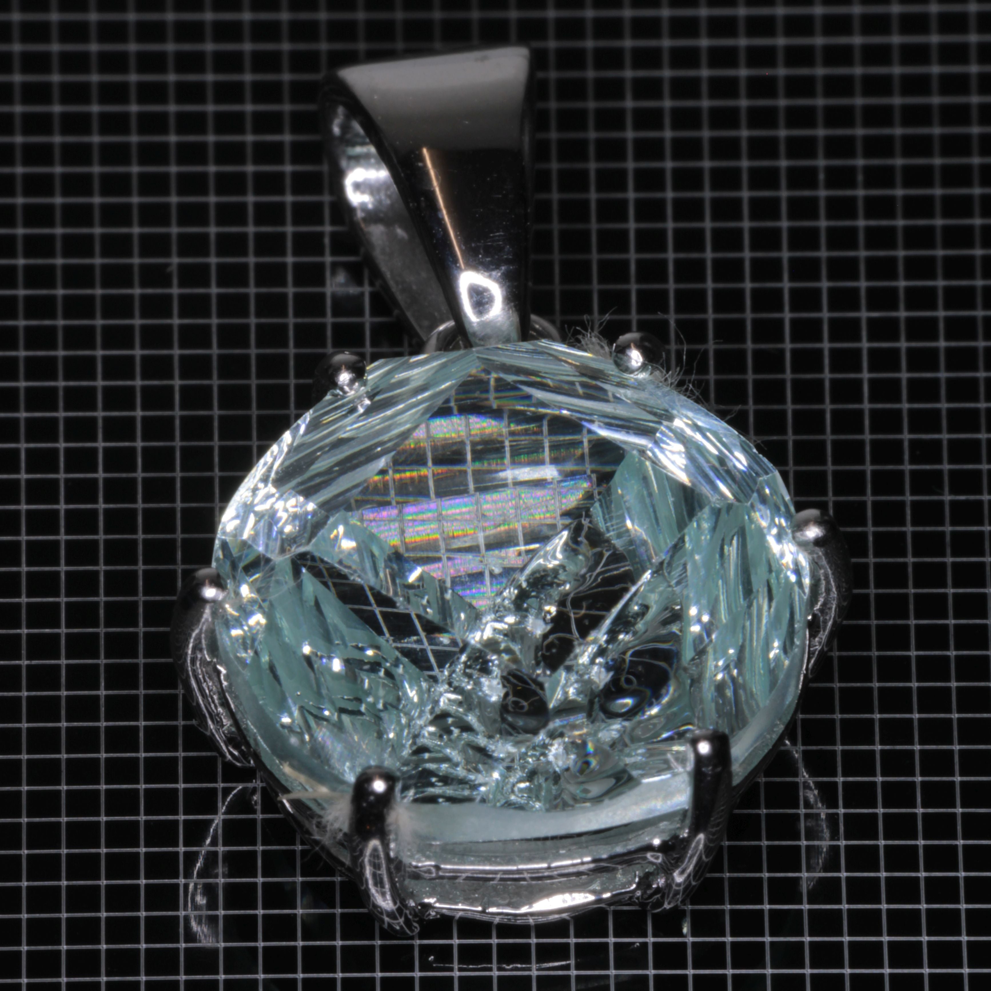 Damaged 15mm Yb:YAG gem