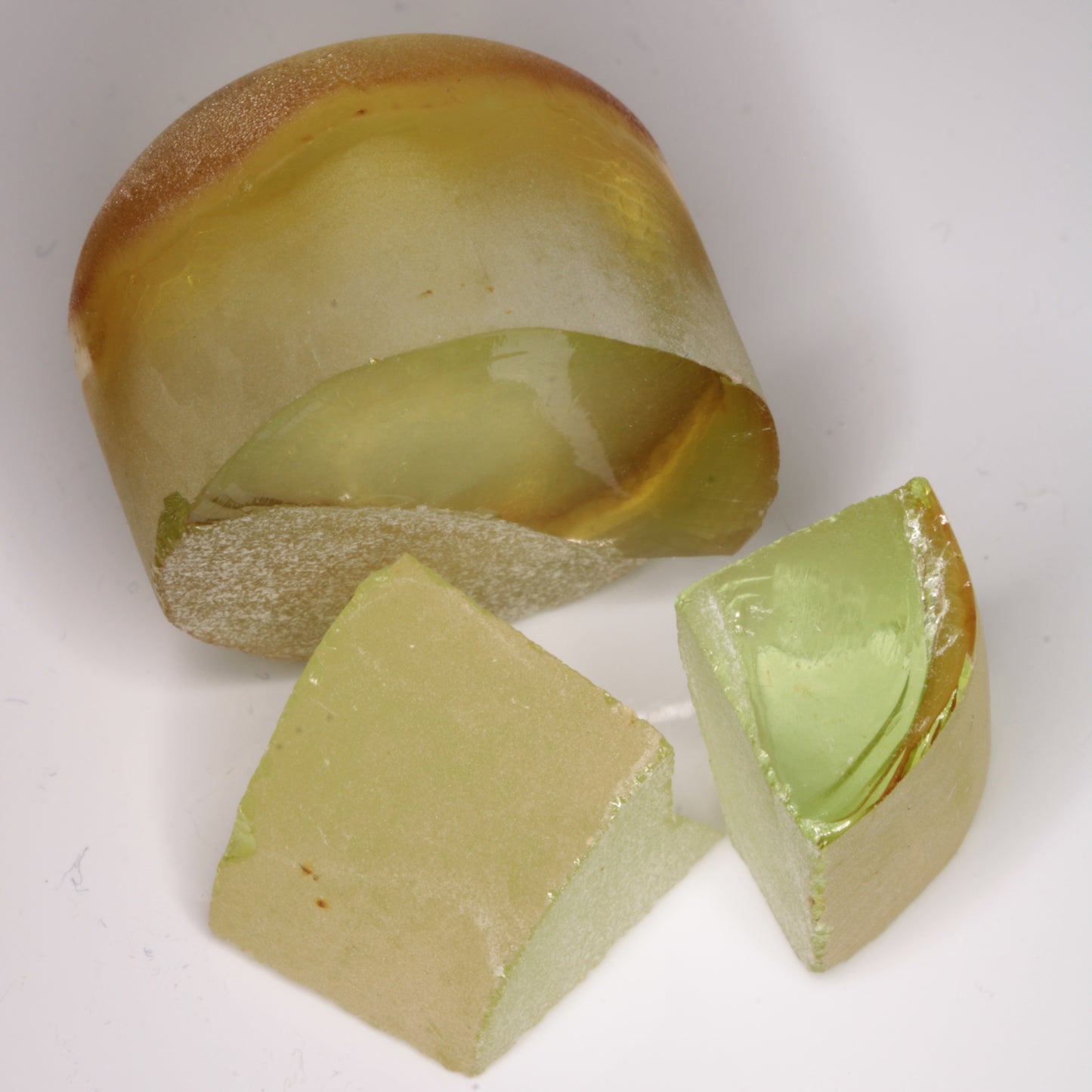 Yellow flame fusion spinel under LED lighting, showing normal colors