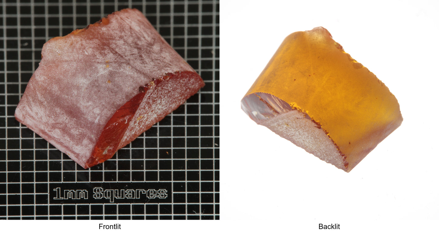 Rough Orange Flame Fusion Sapphire, Semicircle Shaped Piece shown in both normal light and backlit.
