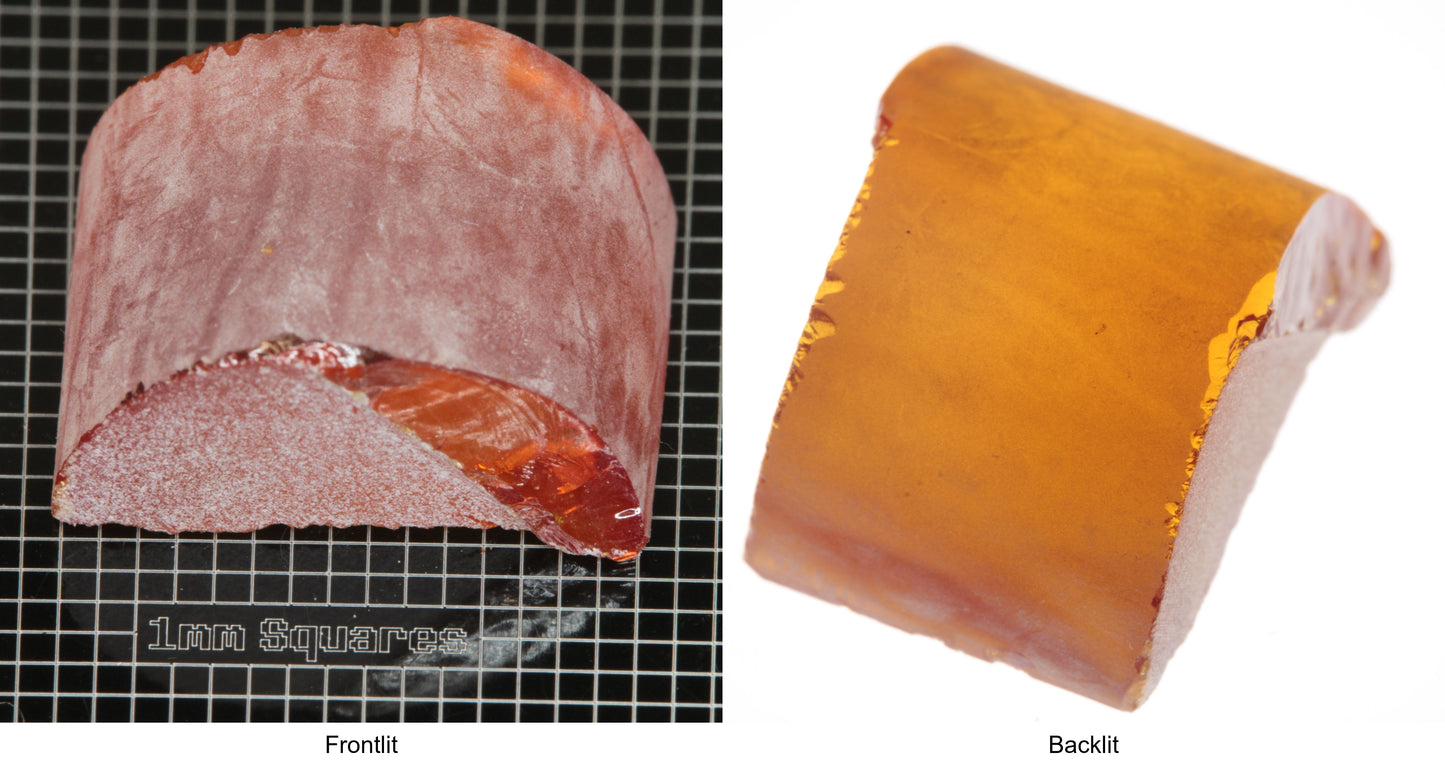 Rough Orange Flame Fusion Sapphire, Semicircle Shaped Piece shown in both normal light and backlit.