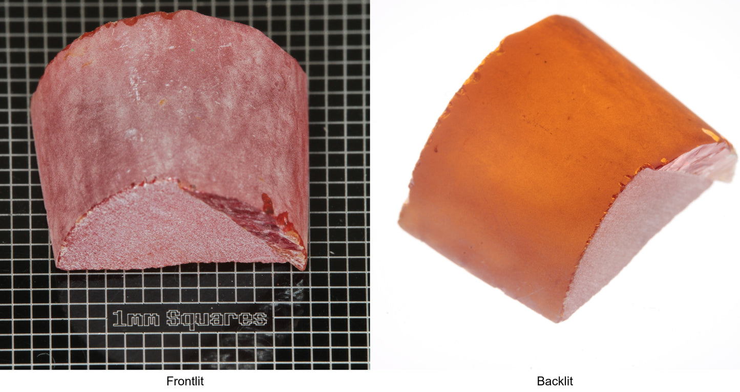 Rough Orange Flame Fusion Sapphire, Semicircle Shaped Piece shown in both normal light and backlit.