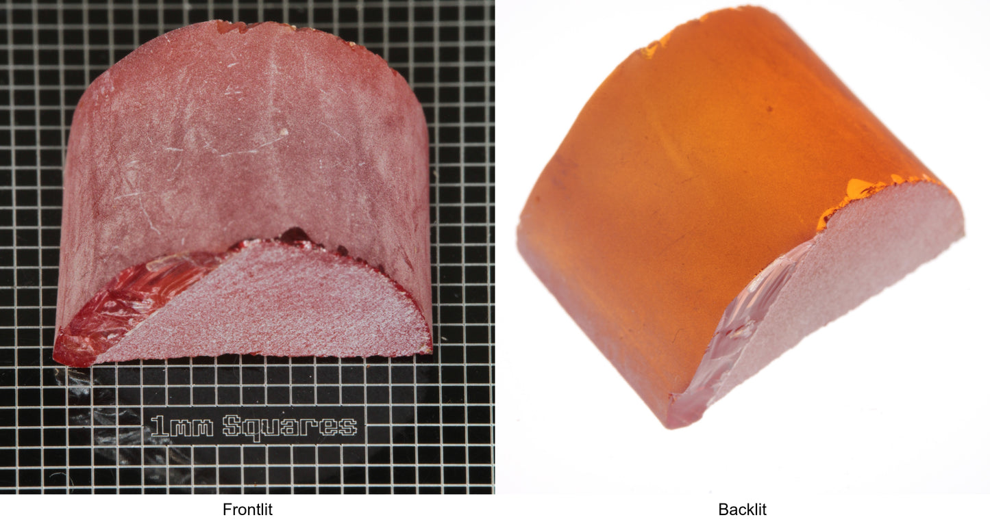 Rough Orange Flame Fusion Sapphire, Semicircle Shaped Piece shown in both normal light and backlit.