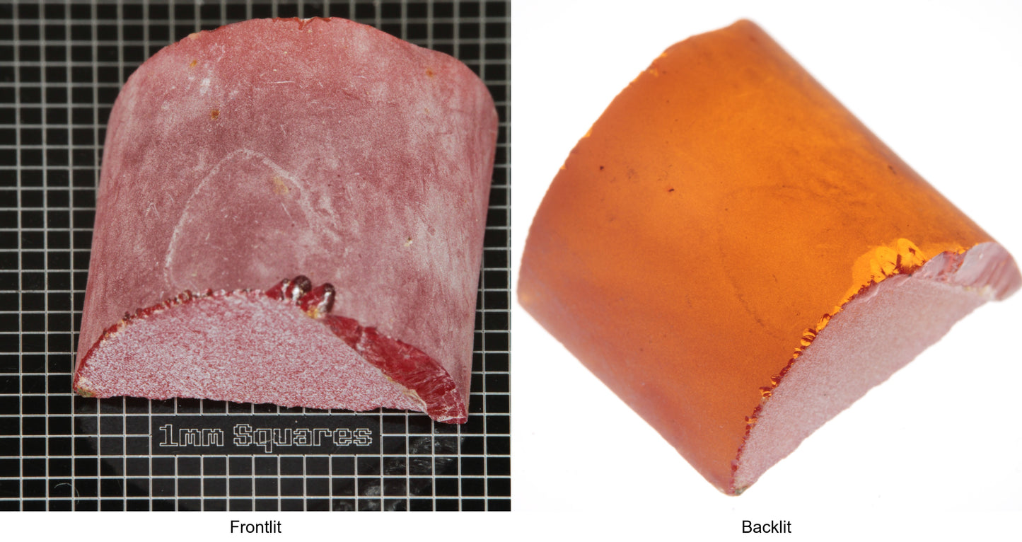 Rough Orange Flame Fusion Sapphire, Semicircle Shaped Piece shown in both normal light and backlit.