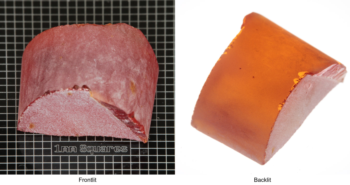Rough Orange Flame Fusion Sapphire, Semicircle Shaped Piece shown in both normal light and backlit.