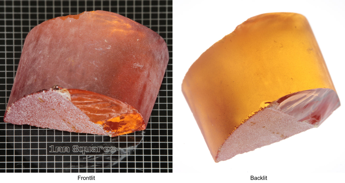 Rough Orange Flame Fusion Sapphire, Semicircle Shaped Piece shown in both normal light and backlit.