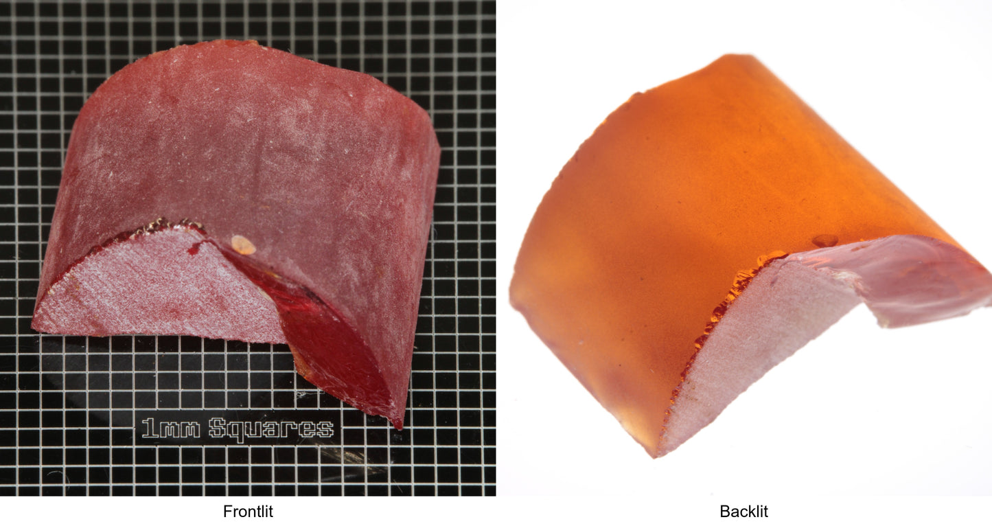 Rough Orange Flame Fusion Sapphire, Semicircle Shaped Piece shown in both normal light and backlit.