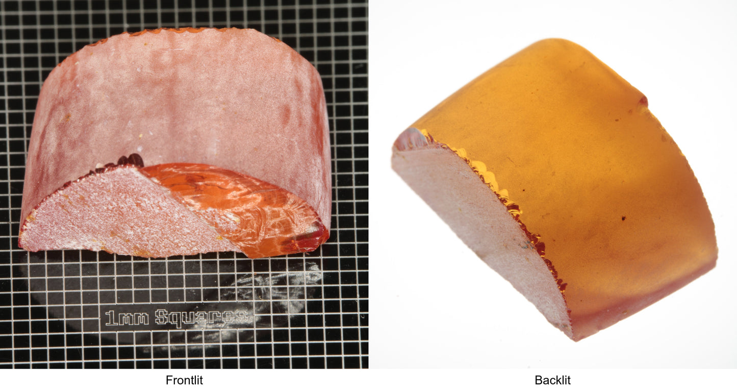 Rough Orange Flame Fusion Sapphire, Semicircle Shaped Piece shown in both normal light and backlit.