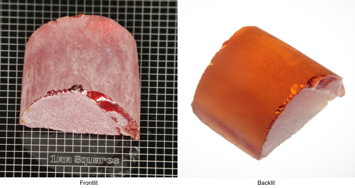 Rough Orange Flame Fusion Sapphire, Semicircle Shaped Piece shown in both normal light and backlit.