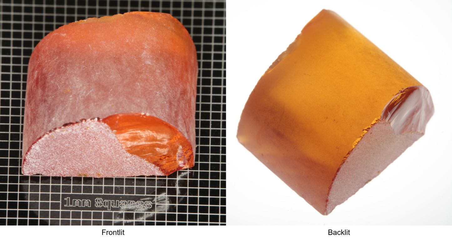 Rough Orange Flame Fusion Sapphire, Semicircle Shaped Piece shown in both normal light and backlit.
