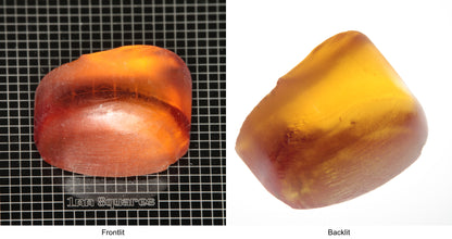 Rough Orange Flame Fusion Sapphire, Semicircle Tail Shaped Piece shown in both normal light and backlit.