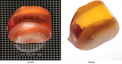 Rough Orange Flame Fusion Sapphire, Semicircle Tail Shaped Piece shown in both normal light and backlit.