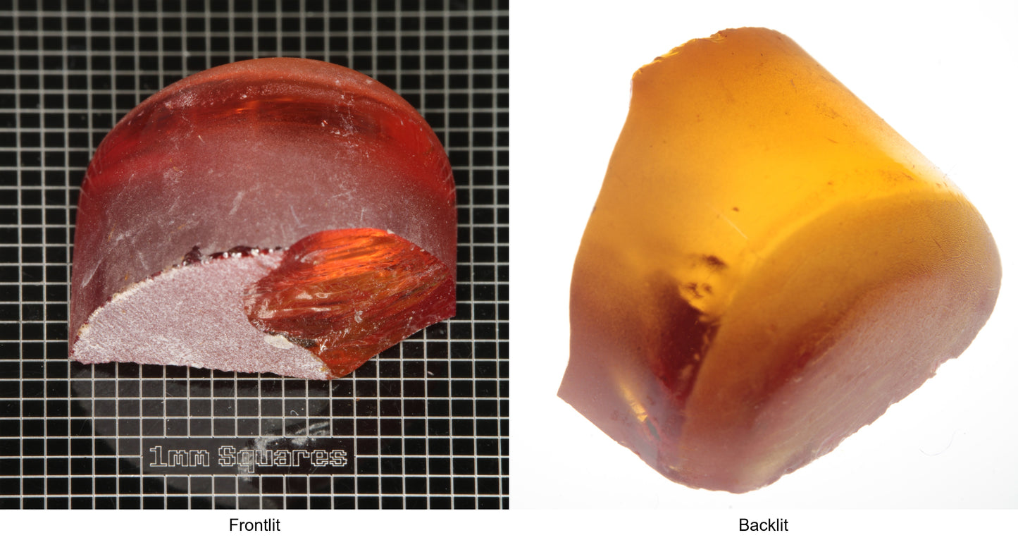 Rough Orange Flame Fusion Sapphire, Semicircle Tail Shaped Piece shown in both normal light and backlit.