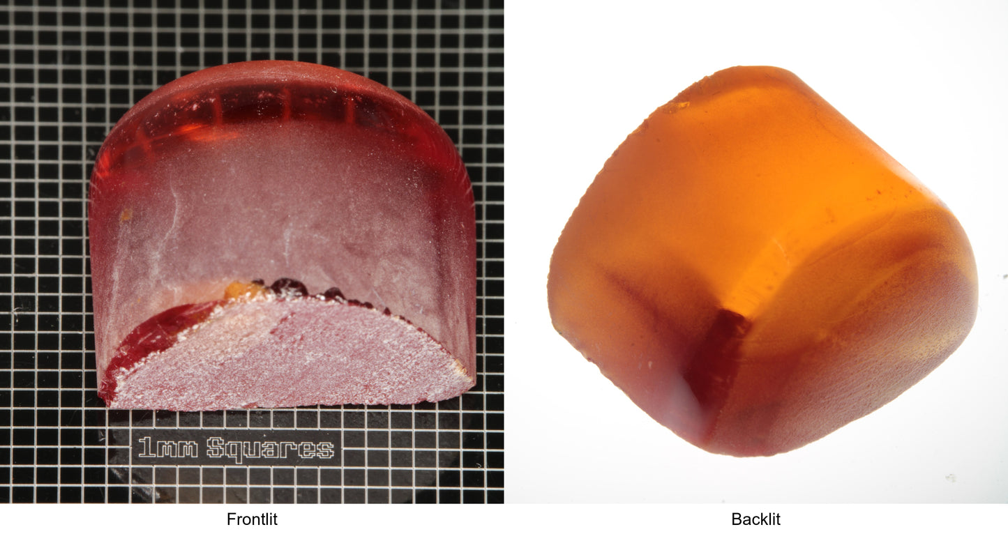Rough Orange Flame Fusion Sapphire, Semicircle Tail Shaped Piece shown in both normal light and backlit.