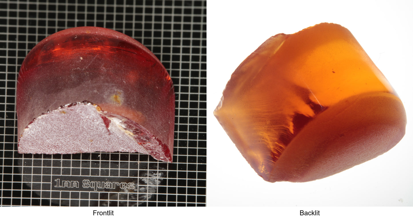 Rough Orange Flame Fusion Sapphire, Semicircle Tail Shaped Piece shown in both normal light and backlit.