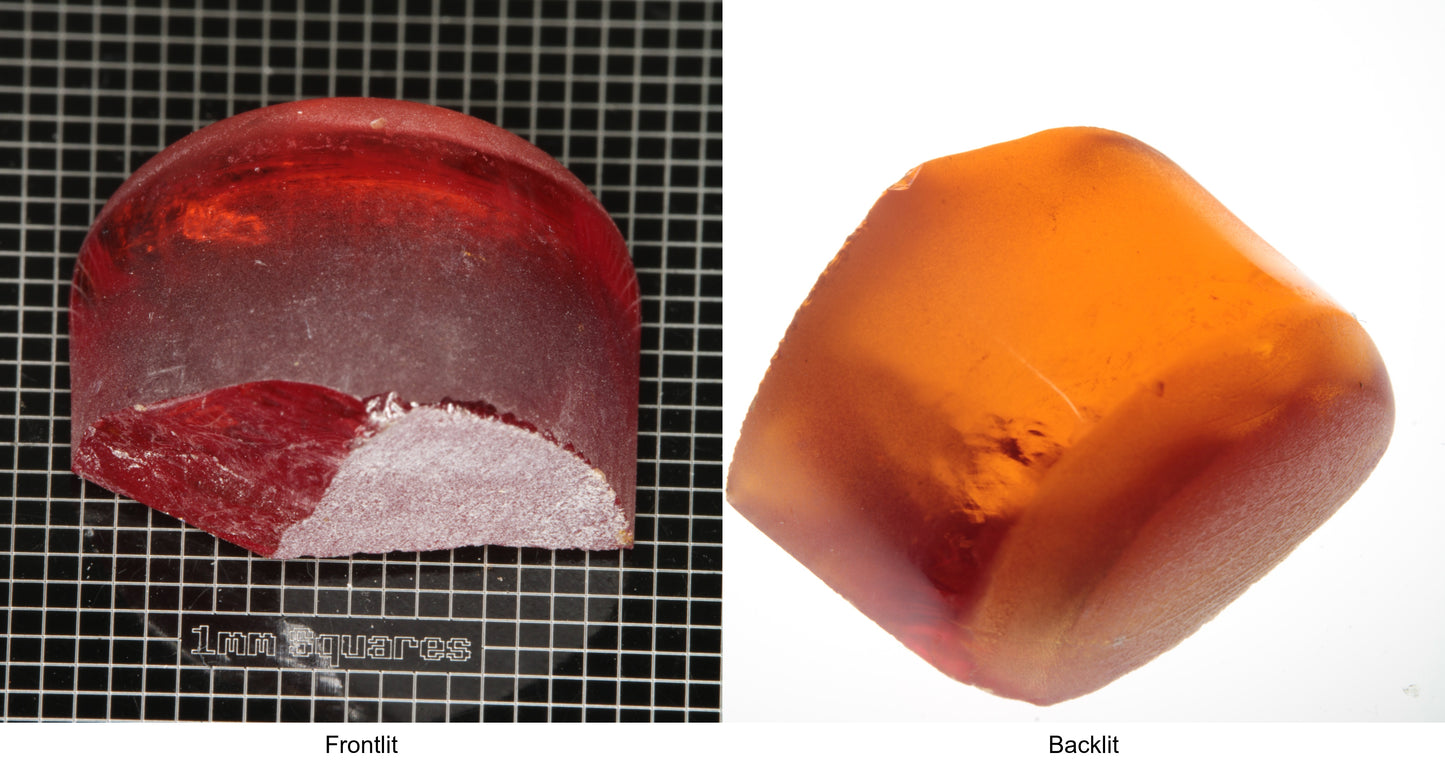 Rough Orange Flame Fusion Sapphire, Semicircle Tail Shaped Piece shown in both normal light and backlit.