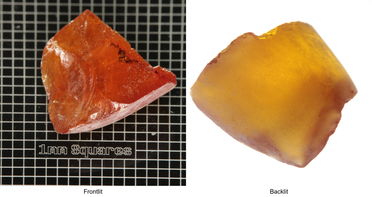 Rough Orange Flame Fusion Sapphire, Shard Shaped Piece shown in both normal light and backlit.