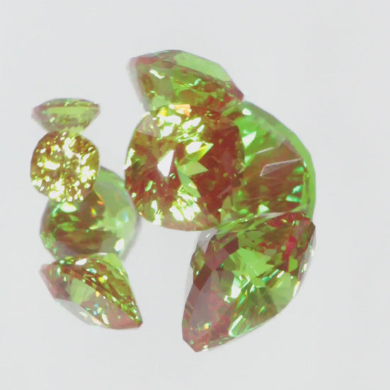 Video of Faceted Cr+3 Christmas Garnet Gems Spinning