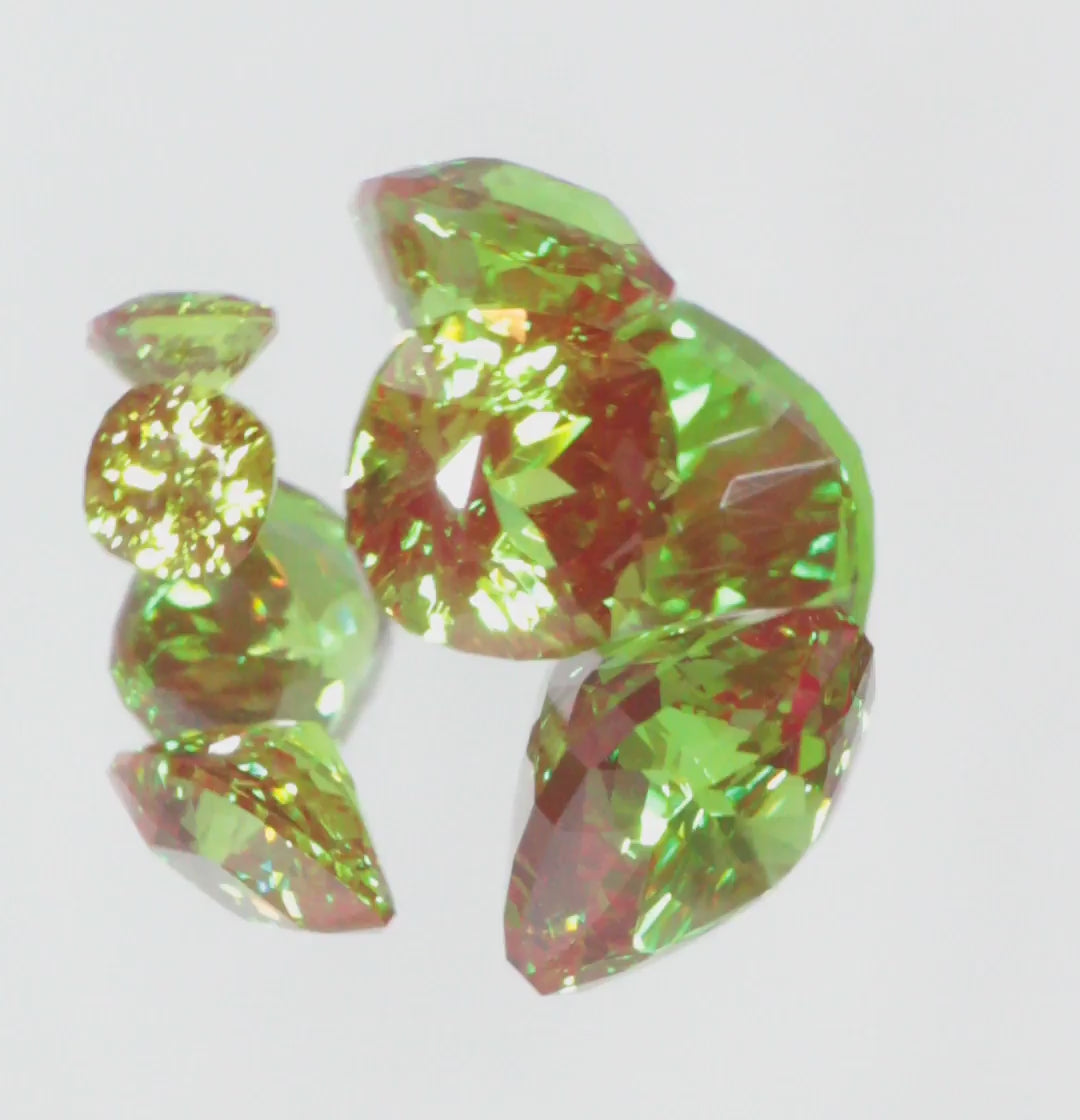 Video of Faceted Cr+3 Christmas Garnet Gems Spinning