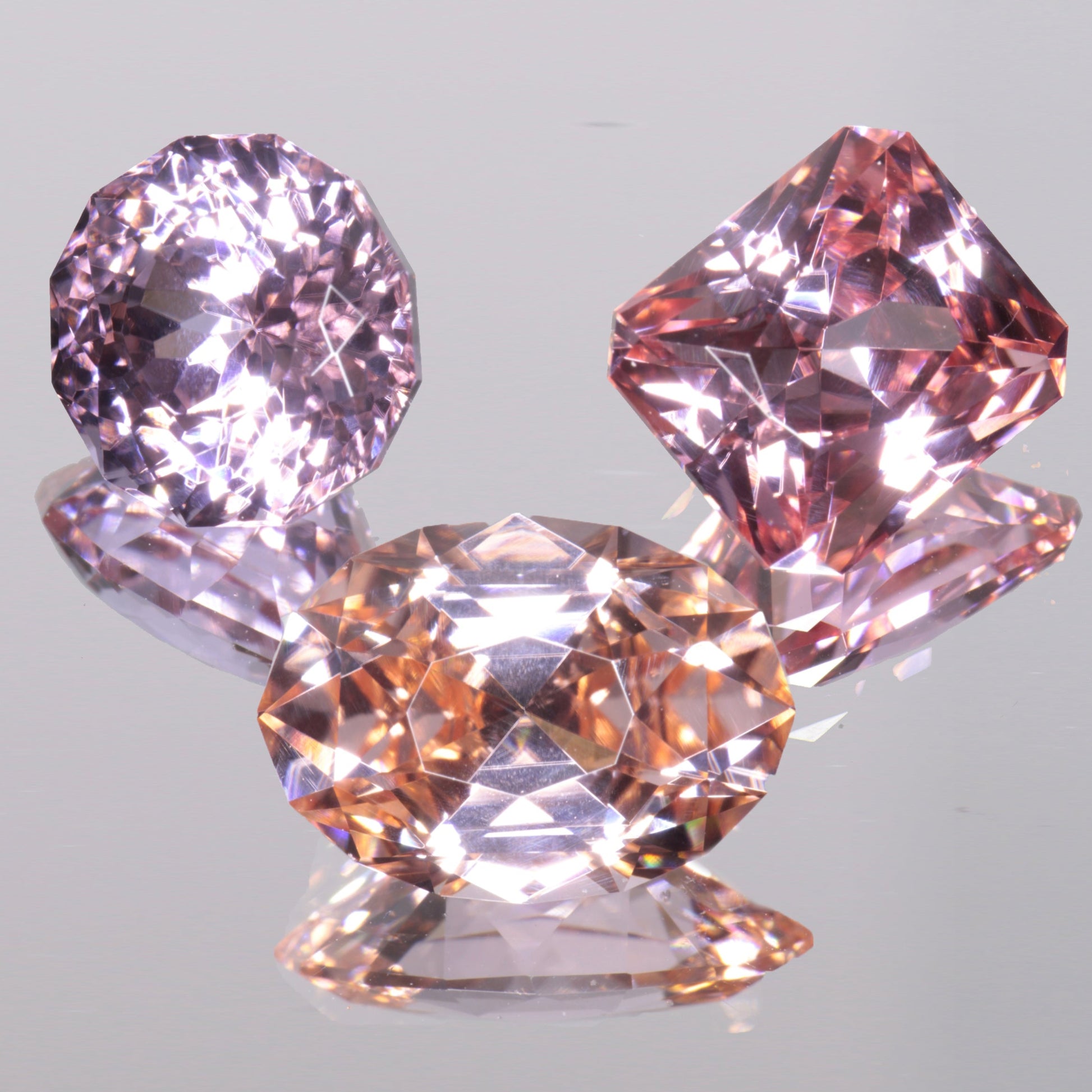 Three Faceted YAP (Yttrium Aluminum Perovskite) Gemstones